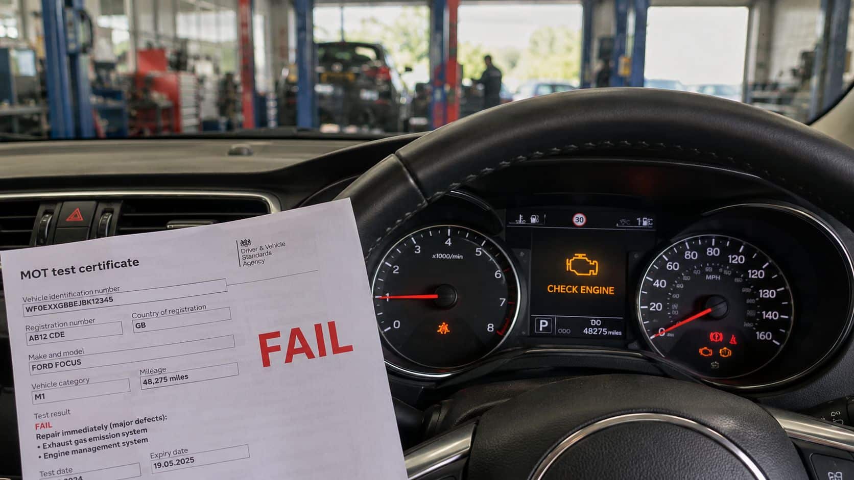 Fault Code P0420 Explained: A UK Driver's Guide 4 A Ford Focus car dashboard showing a check engine warning light next to a failed MOT test certificate.